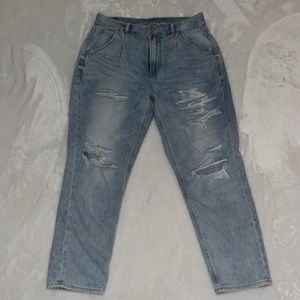 Brand new Never worn American Eagle Blue Jeans with distressed holes.